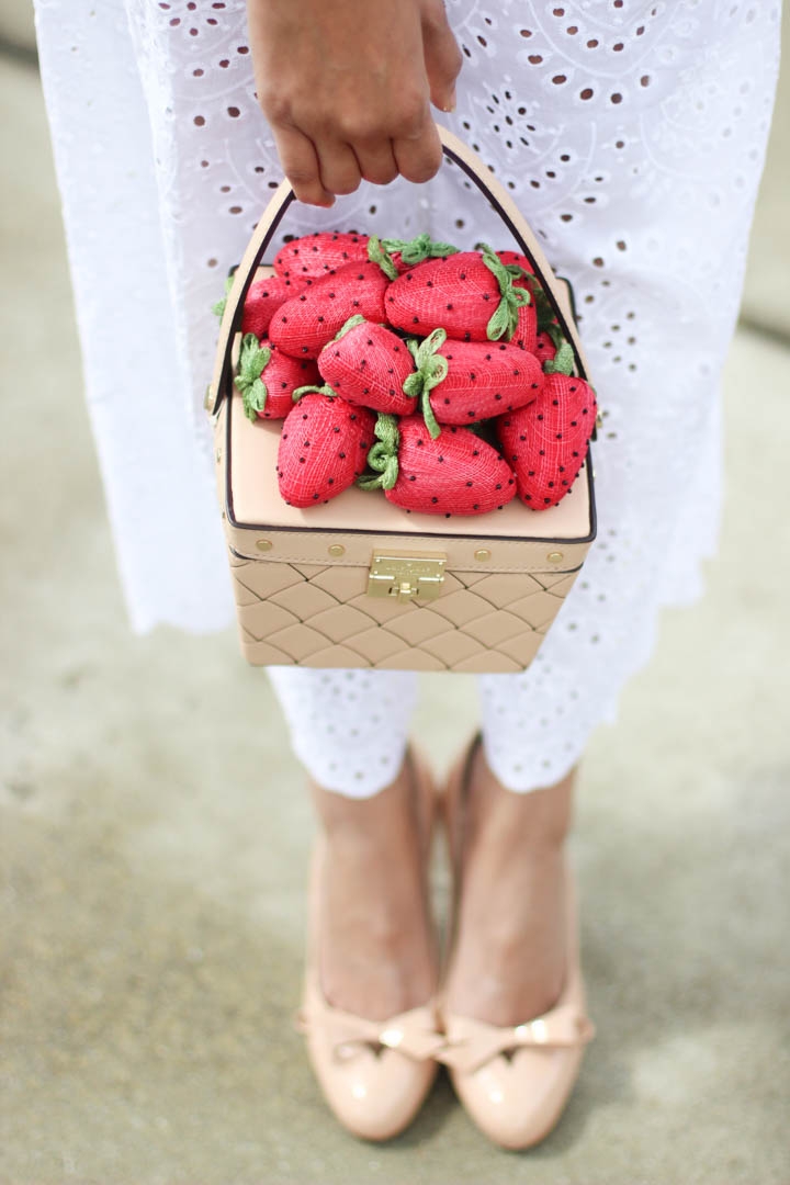 Eyelet Jumpsuit with strawberry bag